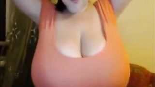 Breasts Bigger Than the Woman's Head: Lantti Irres looking huge in a peach top