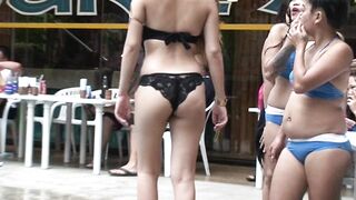 Bikinis: Oriental bikini gal at pool party