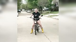 large booty swerving on a bike