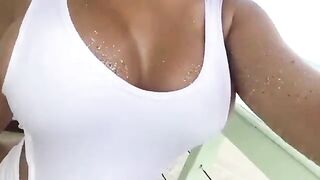 Happy to help get the sand off with my face. - Barely Contained Tits
