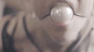 Screencap from Fey's "Amo" music video - BDSM
